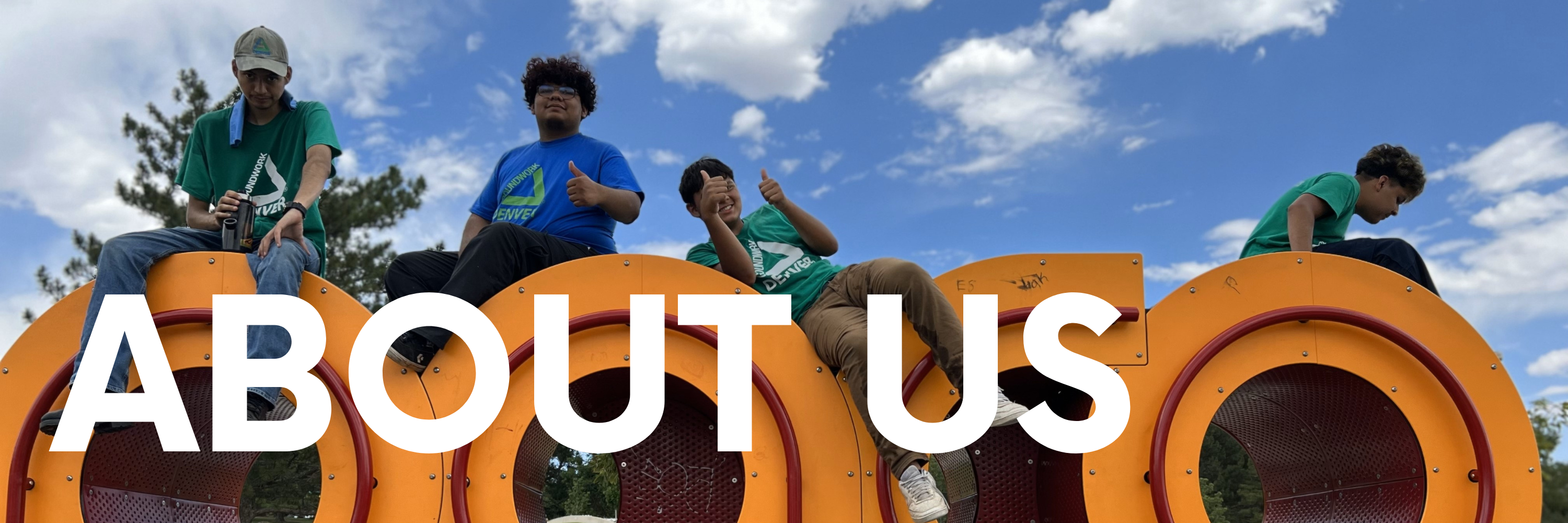 About Us. Background image is youth sitting on an art installation, making peace signs.