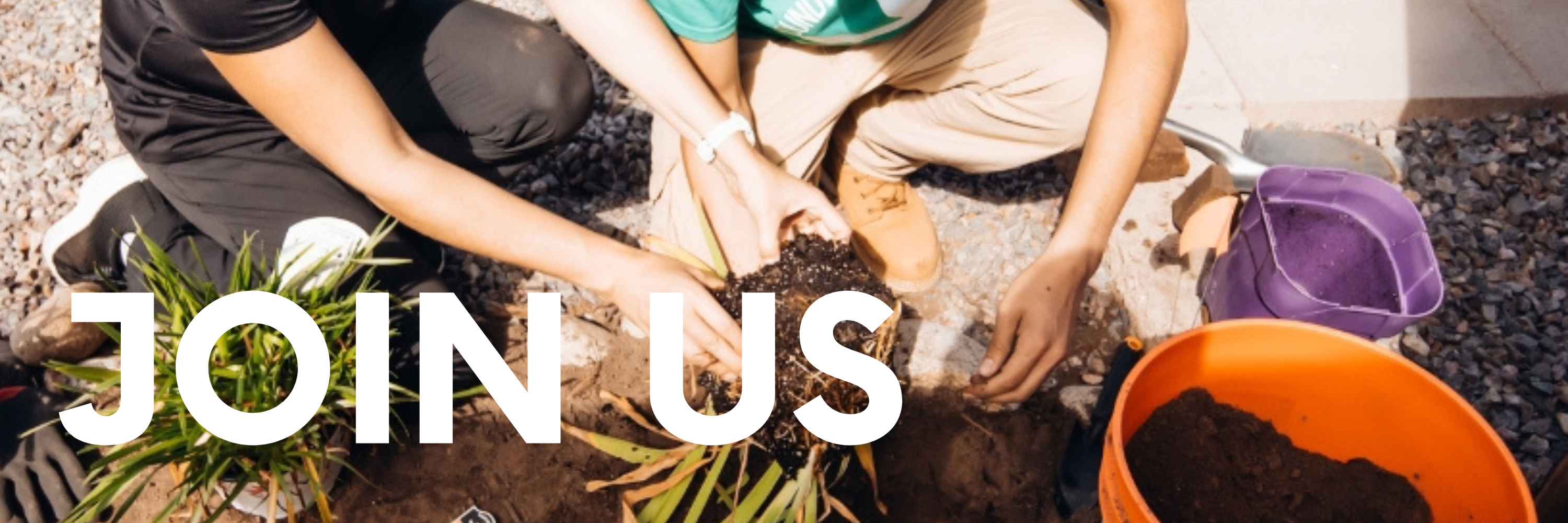 Join Us. Image is an up-close of two people planting a plant in a garden.